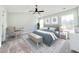 Bedroom with a king-size bed, chair, and large windows at 1424 Nathan Dr., Loris, SC 29569