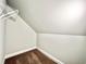 Small attic closet with wire shelving and carpet flooring at 1424 Nathan Dr., Loris, SC 29569