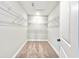 Large walk-in closet with wire shelving and carpet flooring at 1424 Nathan Dr., Loris, SC 29569
