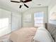 Bright bedroom with double doors and carpet flooring at 1424 Nathan Dr., Loris, SC 29569