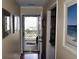Bright hallway with hardwood floors, leading to bedrooms and other areas of the condo at 206 60Th Ave. N # 203, North Myrtle Beach, SC 29582