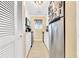 Efficient galley kitchen with stainless steel appliances and ample cabinet space at 206 60Th Ave. N # 203, North Myrtle Beach, SC 29582