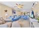 Spacious living room with comfortable seating and access to balcony at 206 60Th Ave. N # 203, North Myrtle Beach, SC 29582