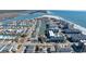 Aerial view of waterfront property with neighboring houses and a beach in the background at 206 60Th Ave. N # 203, North Myrtle Beach, SC 29582