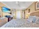 Bedroom with queen bed, dresser, and access to hallway at 206 60Th Ave. N # 203, North Myrtle Beach, SC 29582