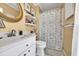 Clean bathroom with shower/tub combo and vanity at 206 60Th Ave. N # 203, North Myrtle Beach, SC 29582