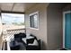 Private balcony with comfortable seating, perfect for relaxing and enjoying ocean views at 206 60Th Ave. N # 203, North Myrtle Beach, SC 29582