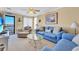 Living room with comfy sofas, a glass coffee table, and a view at 206 60Th Ave. N # 203, North Myrtle Beach, SC 29582