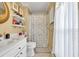 Clean bathroom with shower/tub combo and vanity at 206 60Th Ave. N # 203, North Myrtle Beach, SC 29582