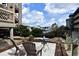 Cozy patio with seating and tranquil water views at 206 60Th Ave. N # 203, North Myrtle Beach, SC 29582