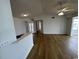 Bright living room with wood-look floors and kitchen at 2273 Huntingdon Dr. # J, Surfside Beach, SC 29575