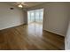 Living room with sunroom and wood-look floors at 2273 Huntingdon Dr. # J, Surfside Beach, SC 29575