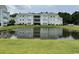 Apartment building with pond view in front at 2273 Huntingdon Dr. # J, Surfside Beach, SC 29575