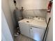 Laundry room with washer, dryer and water heater at 2273 Huntingdon Dr. # J, Surfside Beach, SC 29575