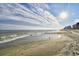 Expansive beach view with ocean waves at 6001 South Kings Hwy., Myrtle Beach, SC 29575