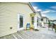 Rear exterior of the house, featuring a door and deck at 6001 South Kings Hwy., Myrtle Beach, SC 29575