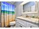 Clean bathroom with granite countertop and updated fixtures at 6001 South Kings Hwy., Myrtle Beach, SC 29575