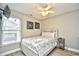 Cozy bedroom with a full-size bed and a flat-screen TV at 6001 South Kings Hwy., Myrtle Beach, SC 29575