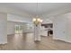 Open concept dining area with views of the kitchen and backyard at 120 Little Cedar Dr., Loris, SC 29569