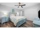 Relaxing bedroom with a light-blue bed frame and coastal decor at 272 Park St., Little River, SC 29566