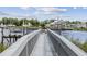 Long wooden dock with a picnic table, offering water views at 272 Park St., Little River, SC 29566