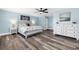 Main bedroom with a king-size bed and coastal-themed decor at 272 Park St., Little River, SC 29566