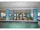 Indoor pool with waterfall feature and lush landscaping at 1501 S Ocean Blvd. # 927, Myrtle Beach, SC 29577