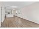 Spacious dining room with hardwood floors and chandelier at 3047 Deerberry Place, Longs, SC 29568