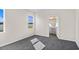 Spacious bedroom with grey carpet and en-suite bathroom access at 3047 Deerberry Place, Longs, SC 29568
