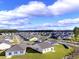 Aerial view of houses and neighborhood at 3047 Deerberry Place, Longs, SC 29568