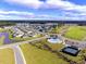 Aerial view of community pool, tennis courts at 3047 Deerberry Place, Longs, SC 29568