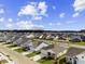 Aerial view of a large community with many houses at 3047 Deerberry Place, Longs, SC 29568