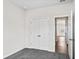 Bedroom with grey carpet, double doors to closet and access to hallway at 3047 Deerberry Place, Longs, SC 29568
