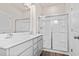 Bathroom with double vanity, large mirror, and a shower at 3047 Deerberry Place, Longs, SC 29568