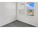 Spacious bedroom with gray carpet and two windows at 3047 Deerberry Place, Longs, SC 29568