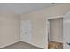 Bedroom with double doors and access to another room at 3009 Deerberry Place, Longs, SC 29568