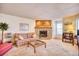 Living room with a fireplace and plaid couch at 4222 Pinehurst Circle # I-7, Little River, SC 29566