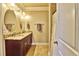 Double vanity bathroom with granite countertop and shower at 202 Palmetto Harbour Dr., North Myrtle Beach, NC 29582