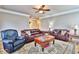 Relaxing living room with leather sofas, wood floors, and a cozy atmosphere at 202 Palmetto Harbour Dr., North Myrtle Beach, NC 29582