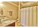 Clean bathroom with shower and granite countertop at 202 Palmetto Harbour Dr., North Myrtle Beach, NC 29582