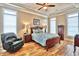 Spacious bedroom with hardwood floors and a ceiling fan at 202 Palmetto Harbour Dr., North Myrtle Beach, NC 29582
