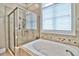 Bathroom with a large shower and a soaking tub at 202 Palmetto Harbour Dr., North Myrtle Beach, NC 29582