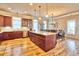 Large kitchen with island, stainless steel appliances, and hardwood floors at 202 Palmetto Harbour Dr., North Myrtle Beach, NC 29582