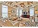 Spacious living room with built-in shelving, hardwood floors, and large windows at 202 Palmetto Harbour Dr., North Myrtle Beach, NC 29582