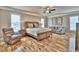 Relaxing bedroom with hardwood floors and a recliner at 202 Palmetto Harbour Dr., North Myrtle Beach, NC 29582