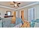Bright bedroom with hardwood floors and en-suite bathroom at 202 Palmetto Harbour Dr., North Myrtle Beach, NC 29582