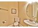 Convenient powder room with single sink and toilet at 202 Palmetto Harbour Dr., North Myrtle Beach, NC 29582