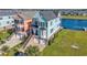 Two-story light blue and orange houses with water views at 489 St. Julian Ln., Myrtle Beach, SC 29579