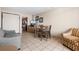 Combined living and dining area with sofa and table at 1501 S Ocean Blvd. # 938, Myrtle Beach, SC 29577