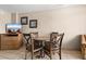Small dining area with four chairs and a round table at 1501 S Ocean Blvd. # 938, Myrtle Beach, SC 29577
